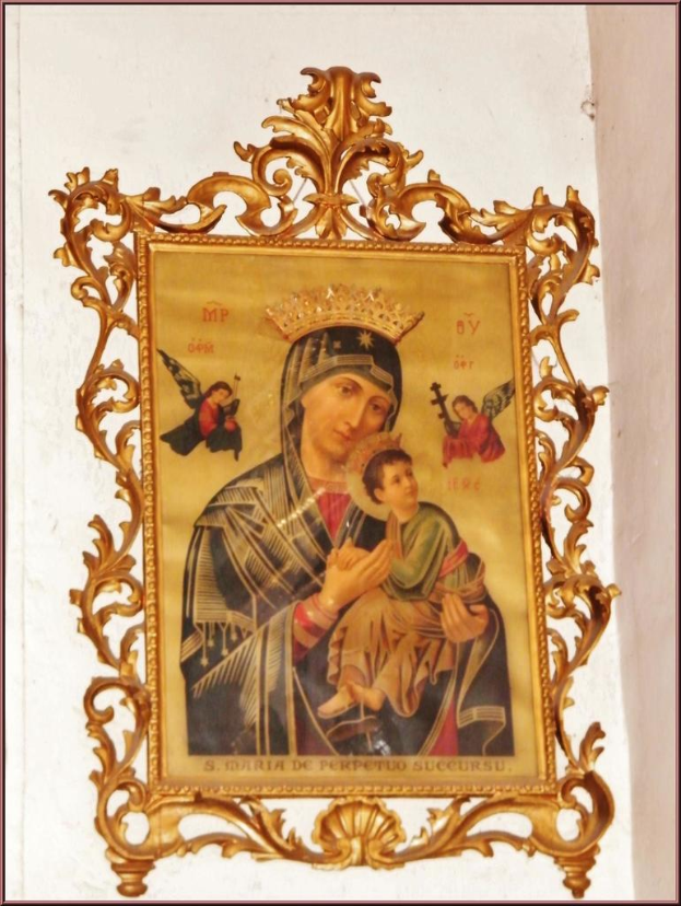 Ein Porträt an einer Wand.