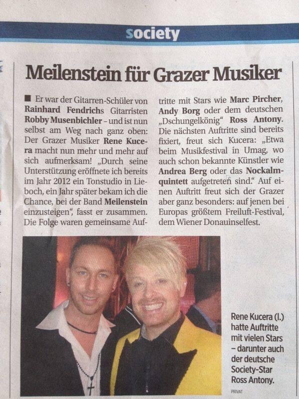 Zwei Männer in Anzügen und Krawatten lächeln in eine Kamera in einem Zeitungsartikel mit der Überschrift "Grazer Musiker", datiert März 2012.