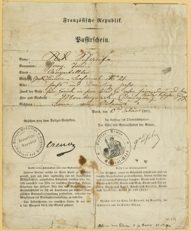 Gelblicher deutscher Regierungsbrief mit einem kreisförmigen schwarz umrandeten Stempel und schwarzer Tinte.