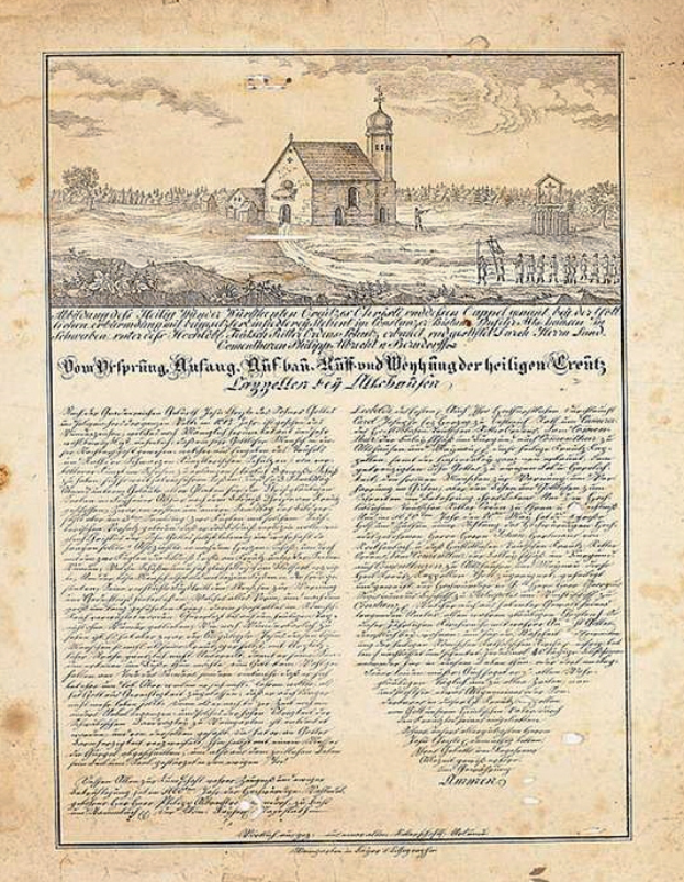 Ein historisches Dokument mit einer Zeichnung einer Kirche in der Mitte, umgeben von Bäumen unter einem klaren blauen Himmel, mit Text aus der ersten Fassung der deutschen Verfassung.
